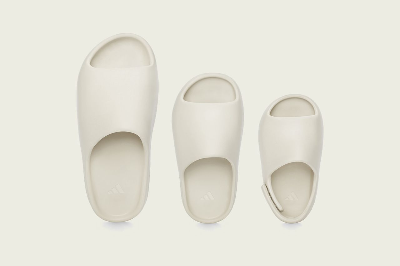 The Yeezy Slide was one piece of foam, and it out-ranked Prada. Bone in adult, kids and infant sizes, from above, adidas launch image.