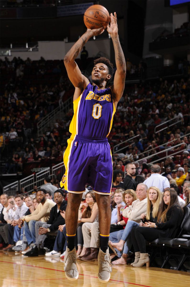 Nick Young played an NBA game in Yeezy 750s before anyone else. Nick Young shooting a jumper in the Yeezy 750 Boost OG, Lakers at Rockets, Toyota Center, Houston, 12 Dec 2015.