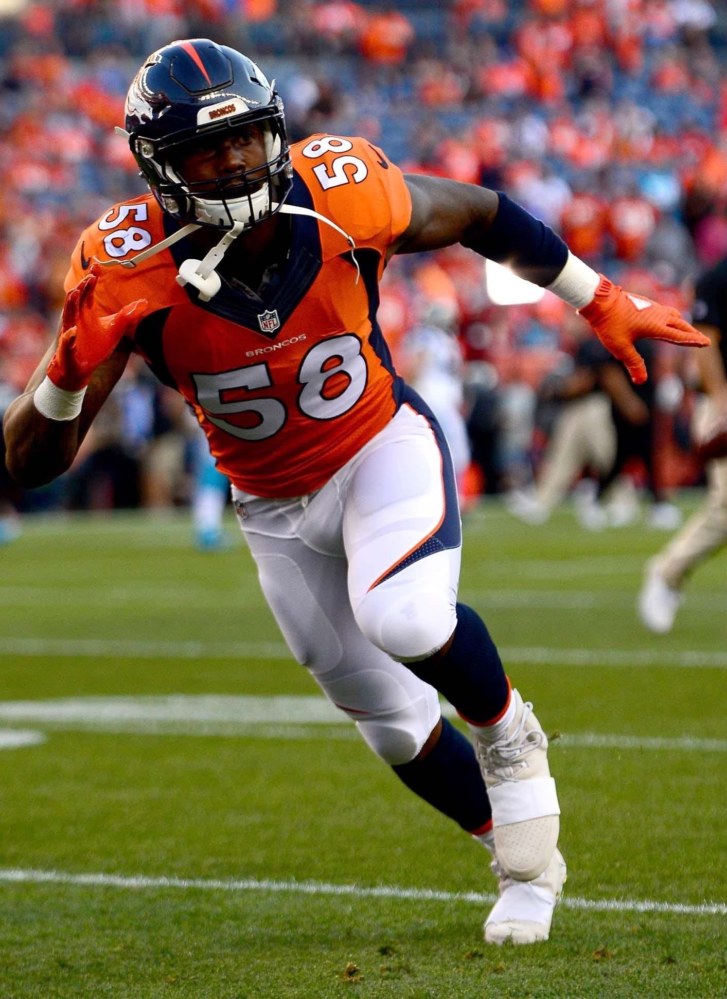Von Miller warmed up in the first Yeezy cleat, then played in something else. Von Miller in pregame warm-ups in the off-white Yeezy 750 cleat, strap and perforated toe visible, Mile High, Denver, 8 Sep 2016.