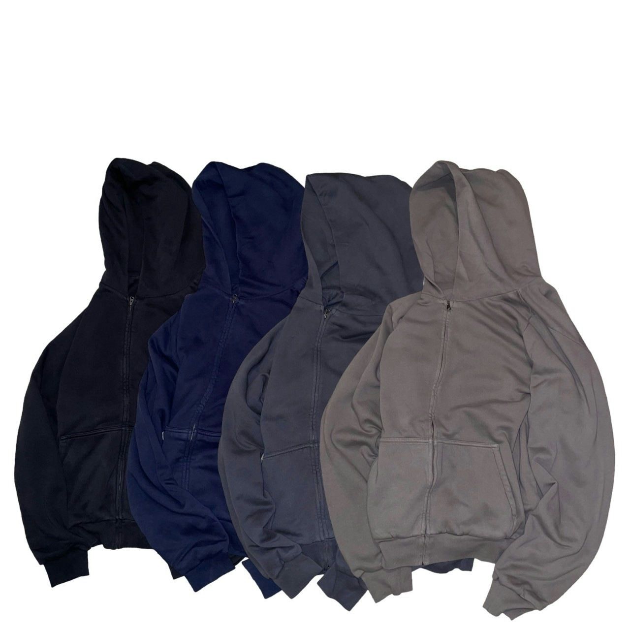 Yeezy Gap never sold a zip-up hoodie. A Harajuku vintage store did. Four zip-ups: black, navy, charcoal and grey.