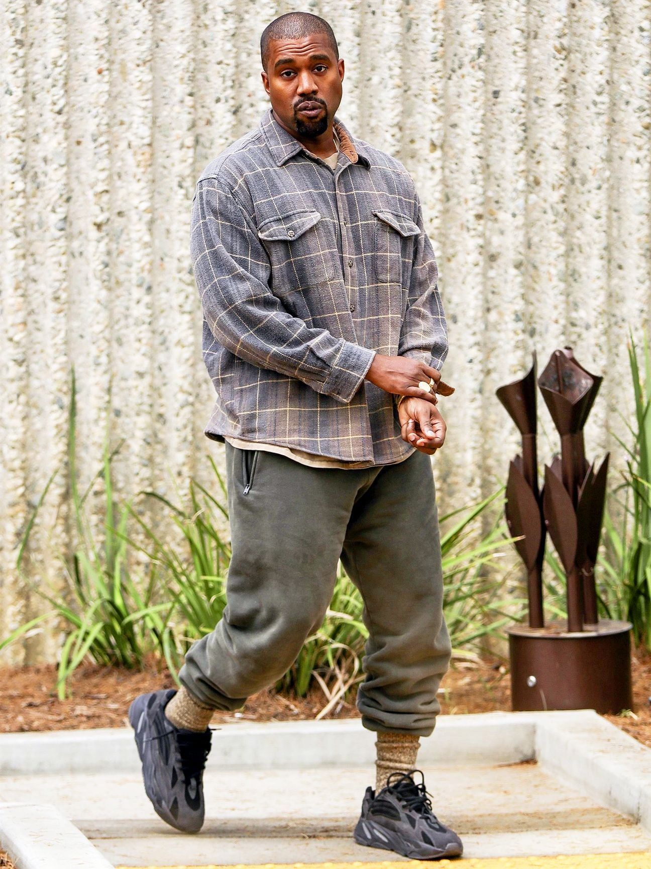 Ye wore Wave Runner samples all through 2017. Everyone else waited on a pre-order.. Ye on 3 Nov 2017 in the unreleased black Wave Runner with reflective 3M, grey plaid shirt, olive sweatpants.