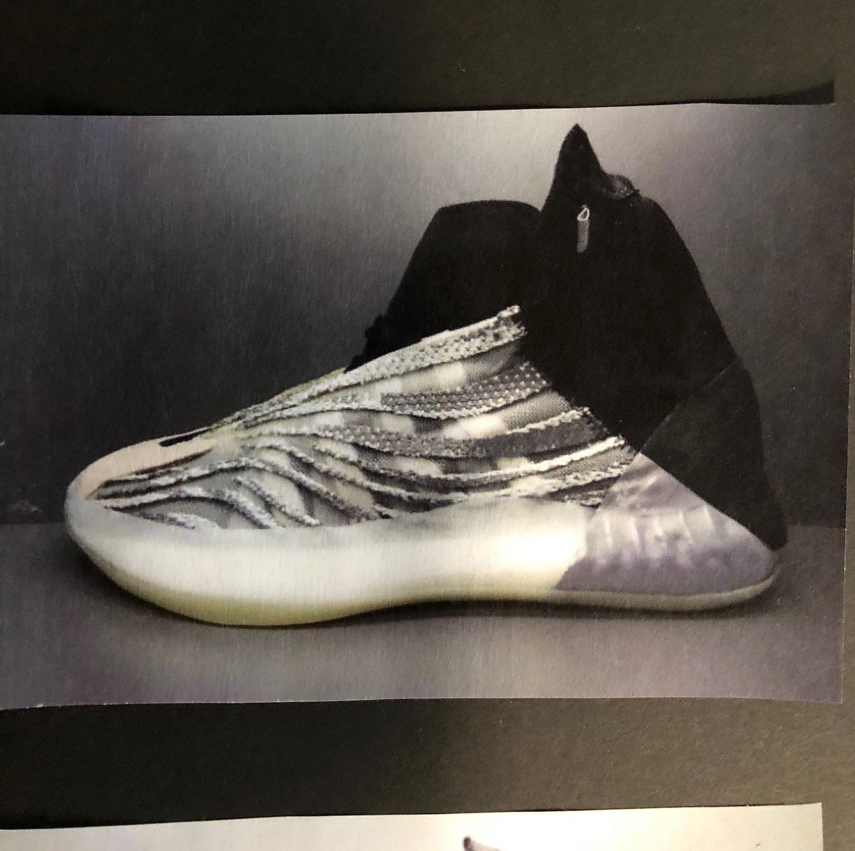 Ye teased a Yeezy basketball shoe in 2018. It arrived by truck in 2020. The Yeezy basketball high-top Ye posted on 19 Apr 2018: swirling knit stripes, ribbed translucent sole.