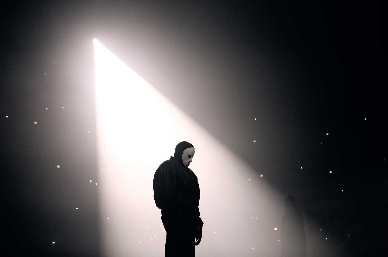 Ye played Vultures to his hometown in a hockey mask and never said a word. Ye alone in a spotlight on the smoke-filled United Center stage, white hockey mask, black leather jacket and trousers, 8 Feb 2024.