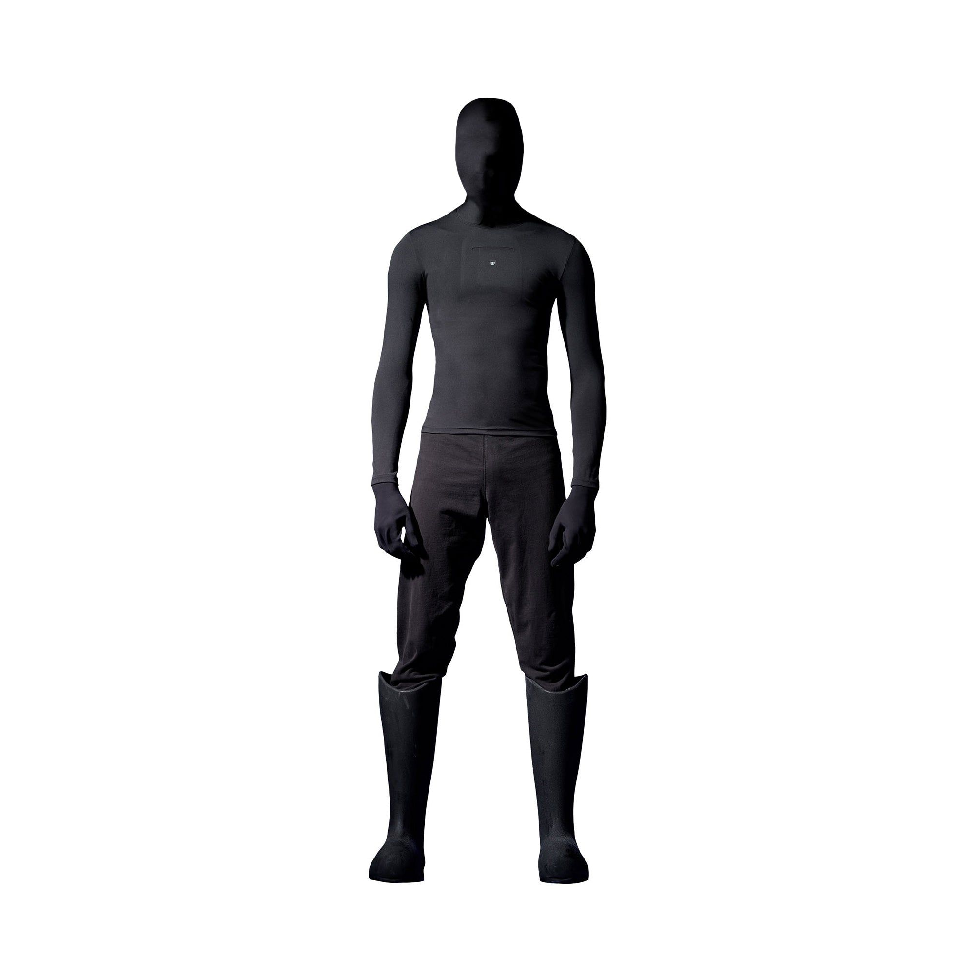 The $80 Second Skin was the plainest thing in Yeezy Gap’s Balenciaga line. Black, men's long sleeve on a masked model.