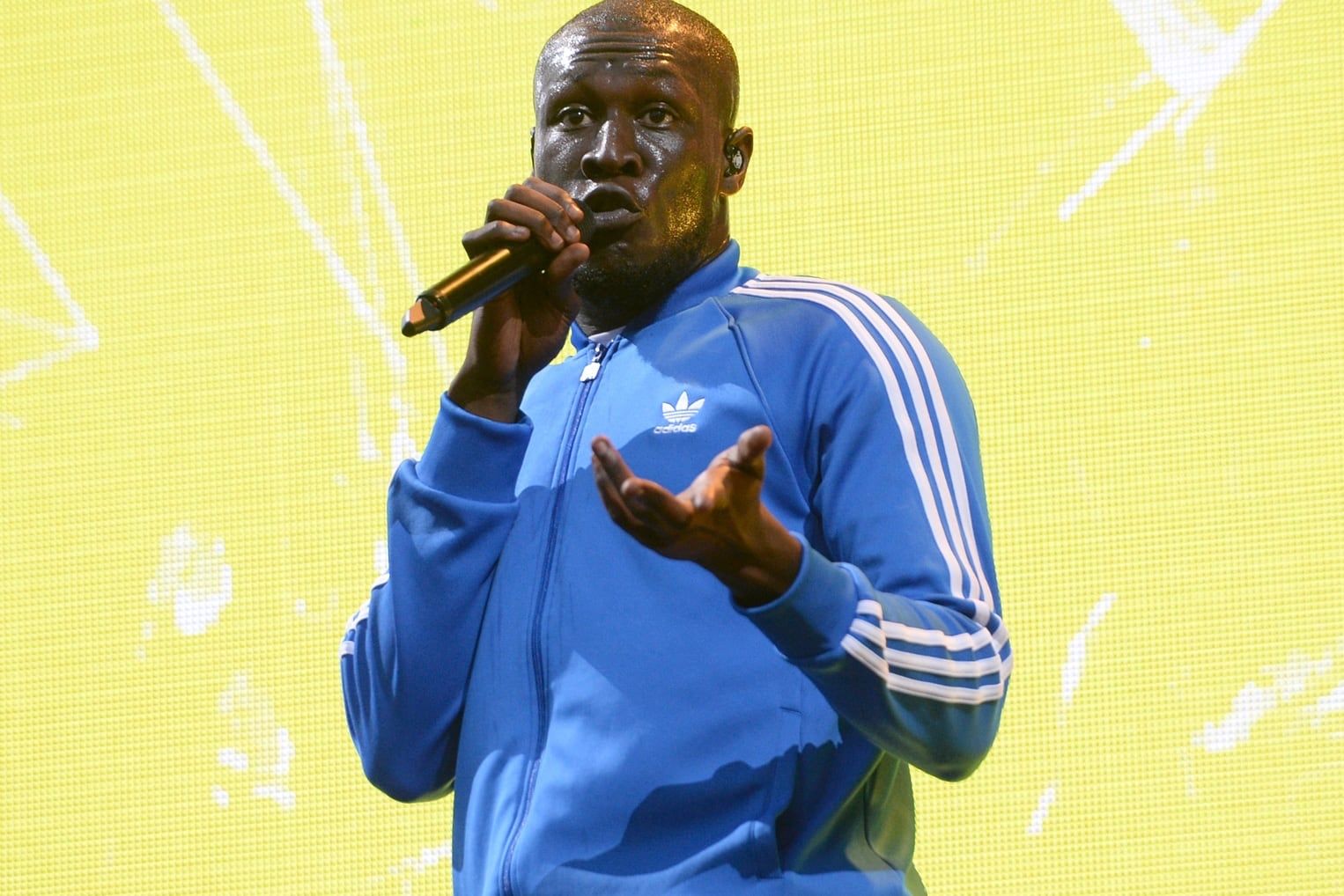 Stormzy wore the Beluga 2.0 early, and adidas’s VP called them 100% real. Stormzy performing in a blue adidas track top, 2017 MTV EMAs, London, 12 Nov 2017.