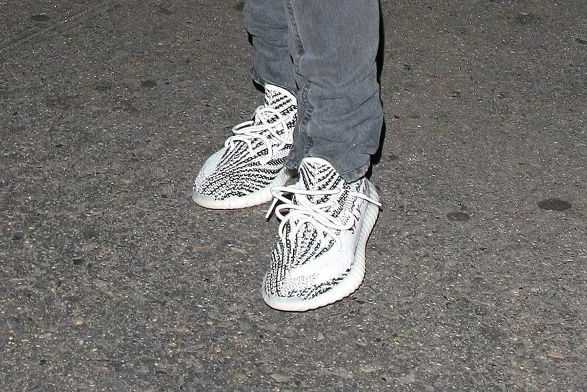 Ye wore the Zebra six months early, and Hypebeast guessed it was a 550. Zebra, on Ye's feet.