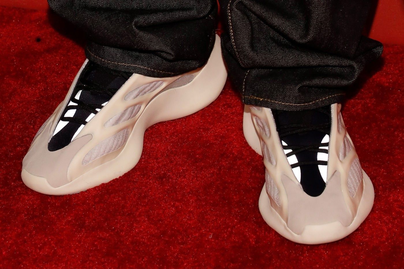 DJ Khaled got the 700 V3 straight off Ye’s feet, three months early. Ye's shoes on the red carpet at FGI's Night of Stars, New York, 24 Oct 2019: the caged 700 V3 in cream with a black bootie.
