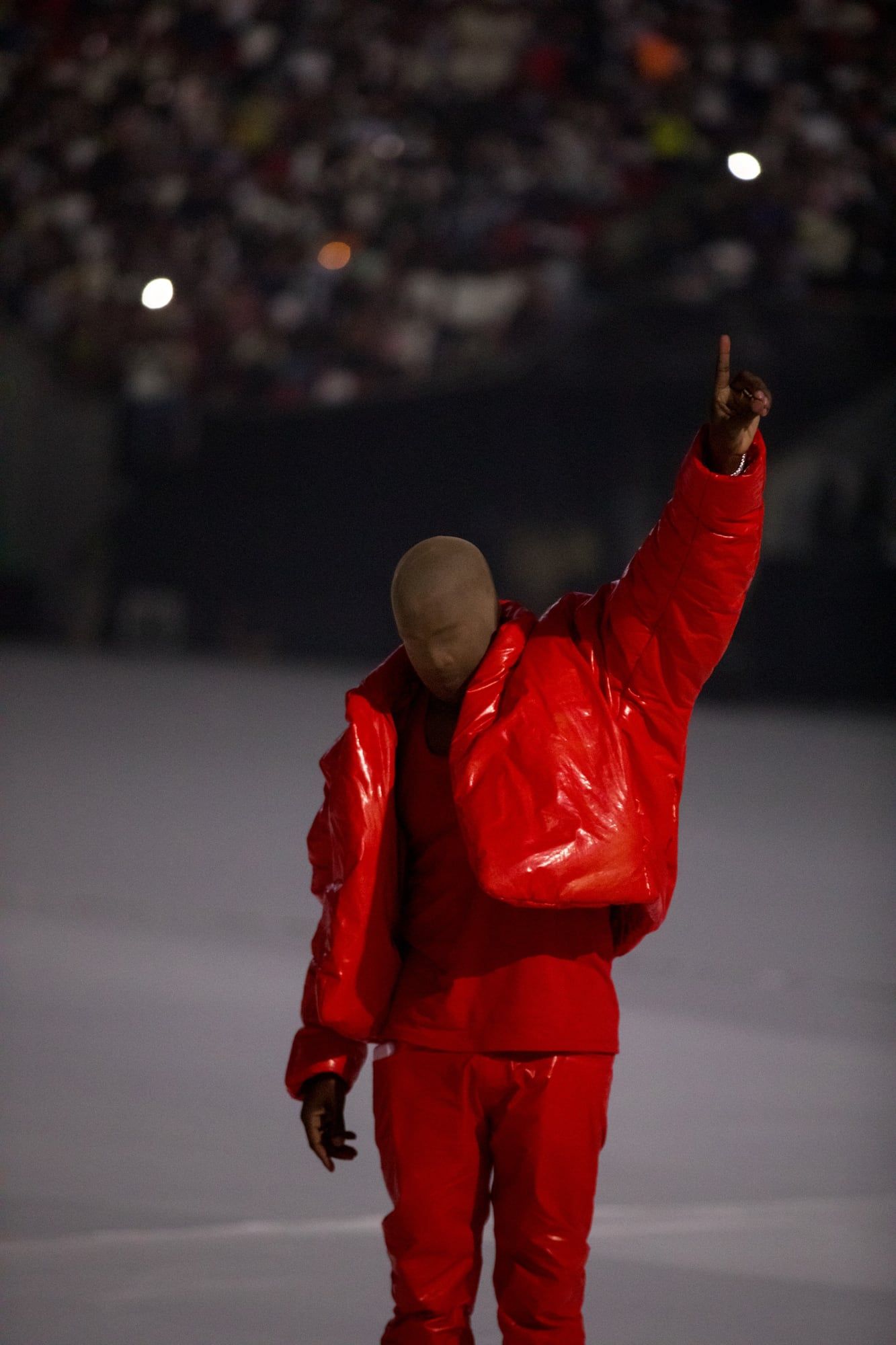 Ye wore all three Round Jacket colours before Gap put them on sale. Red, Ye at the first Donda listening event, Atlanta, 22 Jul 2021.