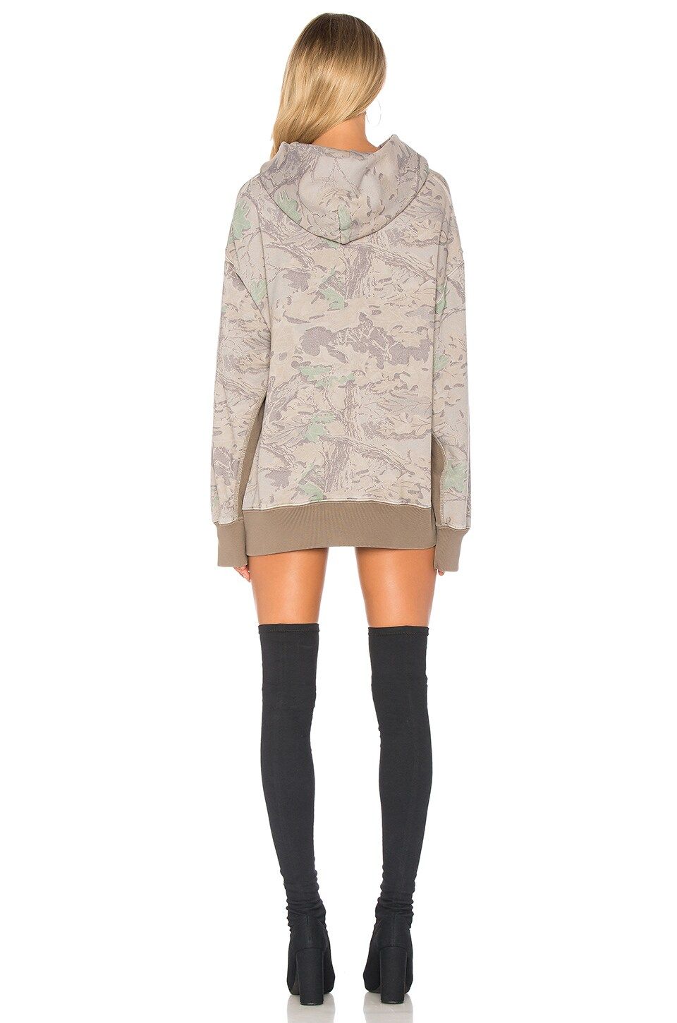 Season 4’s show was all buses and heat. Its camo hoodie went for $375. Camo, back, on a model, Revolve product image.