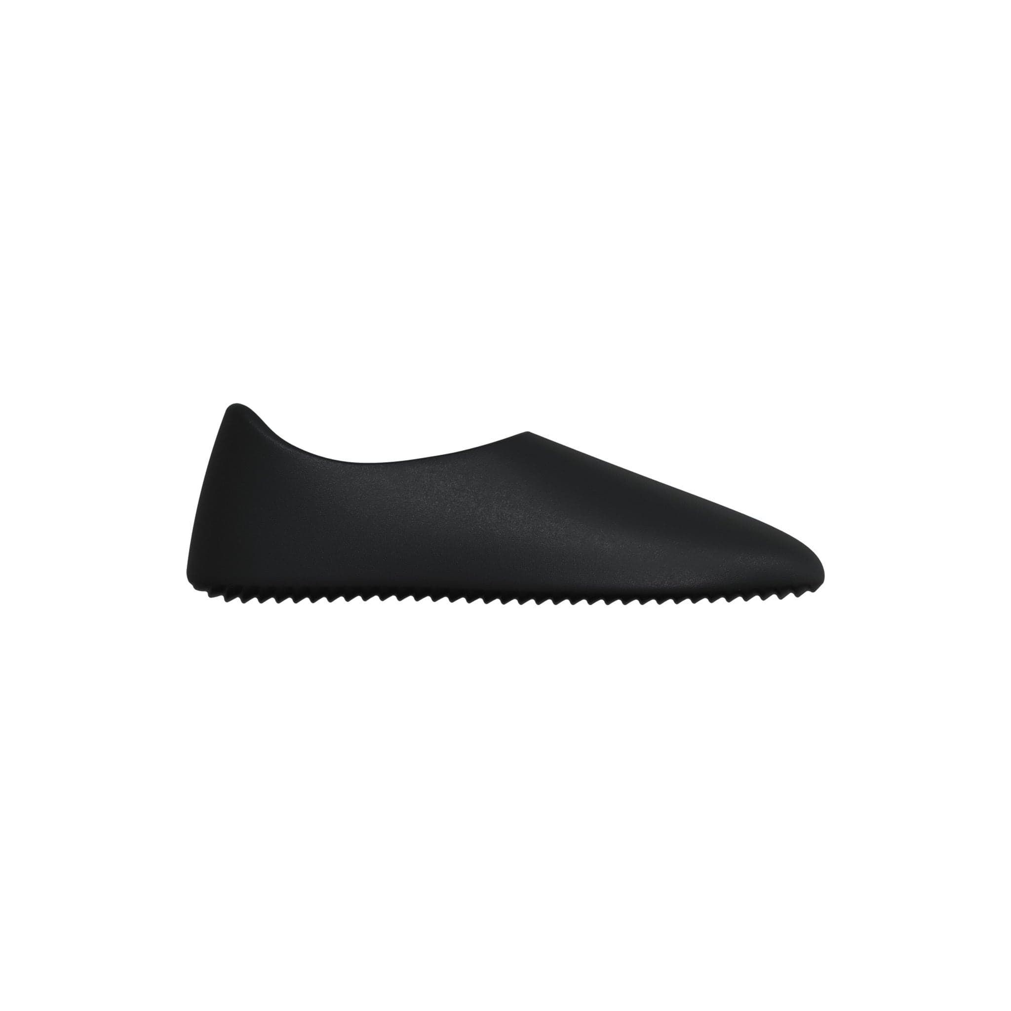 Ye’s $20 SL-01 had no logo. A week later he nicknamed it the Yeezy Slides.. Black, side.