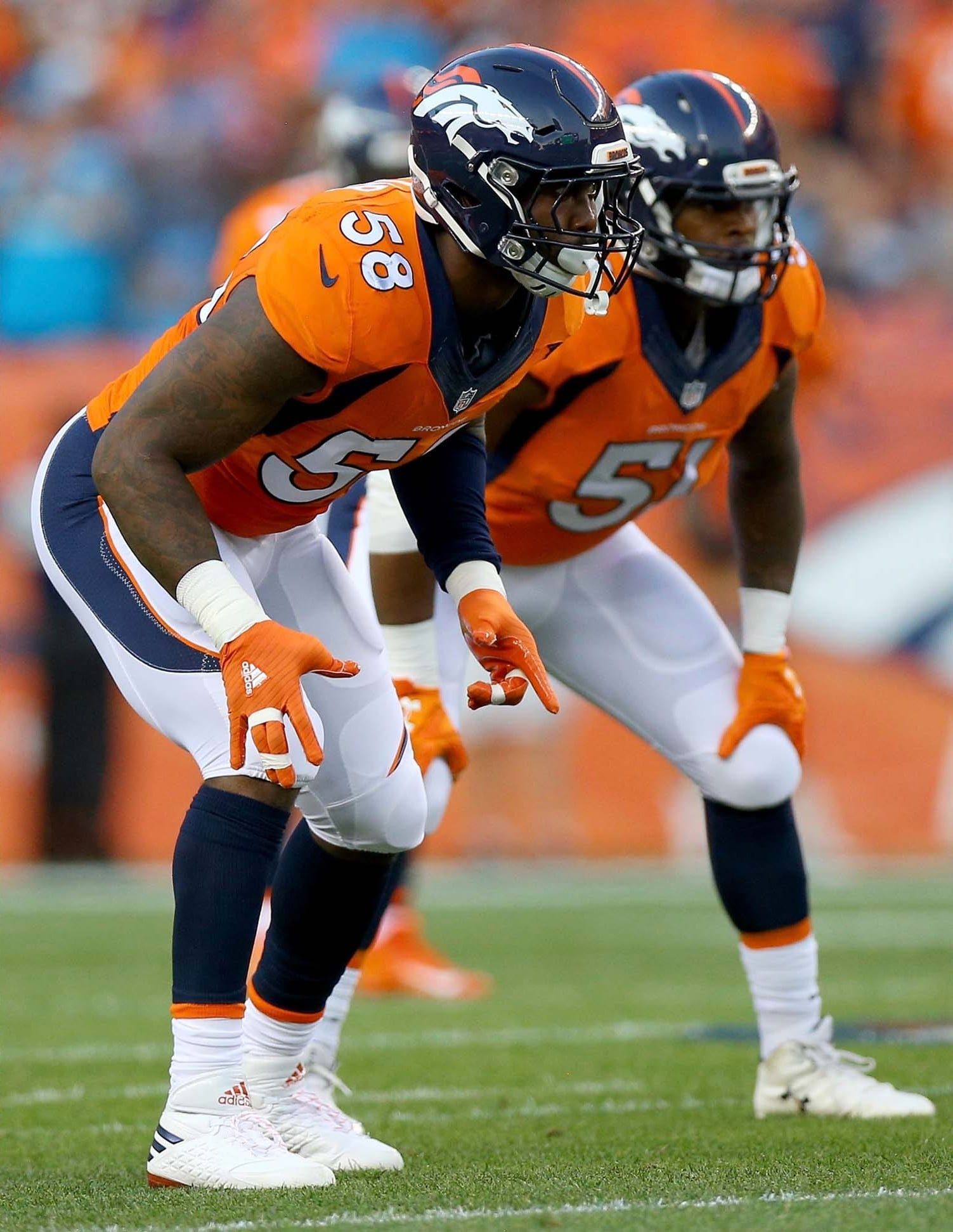 Von Miller warmed up in the first Yeezy cleat, then played in something else. Miller and Todd Davis in the first quarter, Miller in white three-stripe adidas cleats, not the Yeezys, 8 Sep 2016.