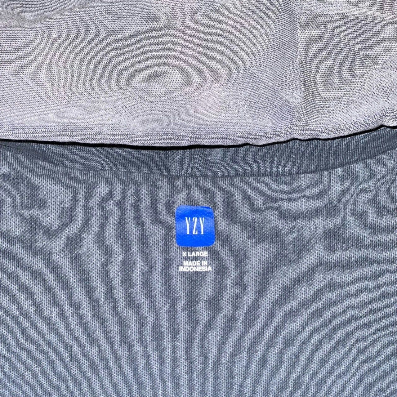Yeezy Gap never sold a zip-up hoodie. A Harajuku vintage store did. Blue YZY tab, X Large, Made in Indonesia.