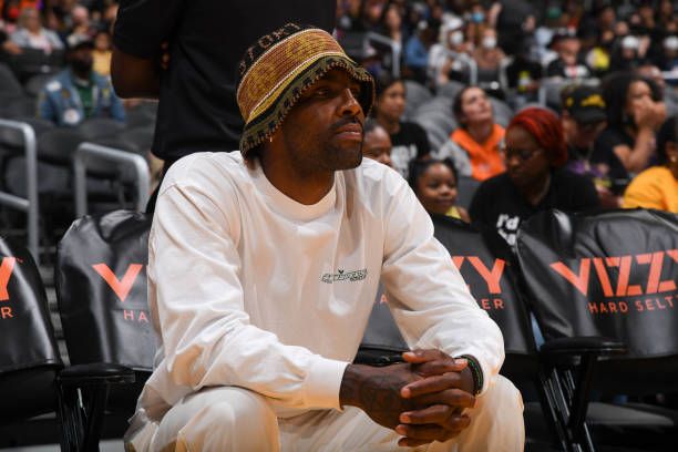Kyrie Irving had his own Nike shoe and still walked in wearing Air Yeezy 2s. Kyrie Irving courtside at Sparks v Storm, Crypto.com Arena, Los Angeles, 7 Jul 2022.