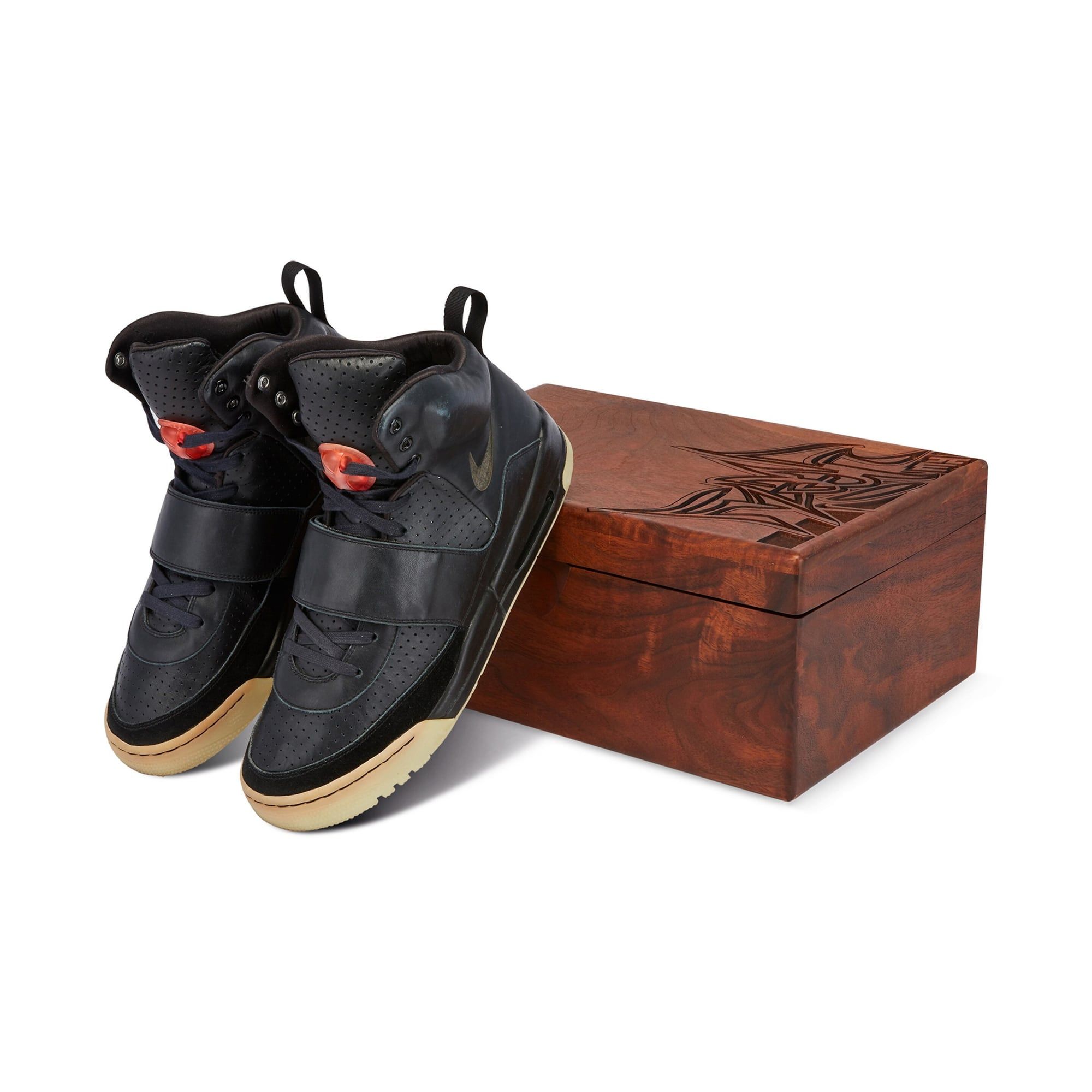 Ye wore an Air Yeezy sample to the 2008 Grammys. It sold for $1.8 million.. The Grammy pair with the carved wooden box by Mark Smith.