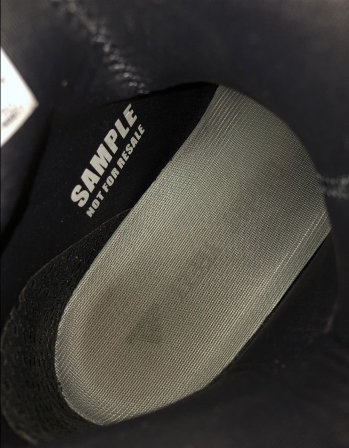 Ye’s choir wore the Scuba at Coachella. It was never sold to the public.. The insole, printed SAMPLE NOT FOR RESALE.