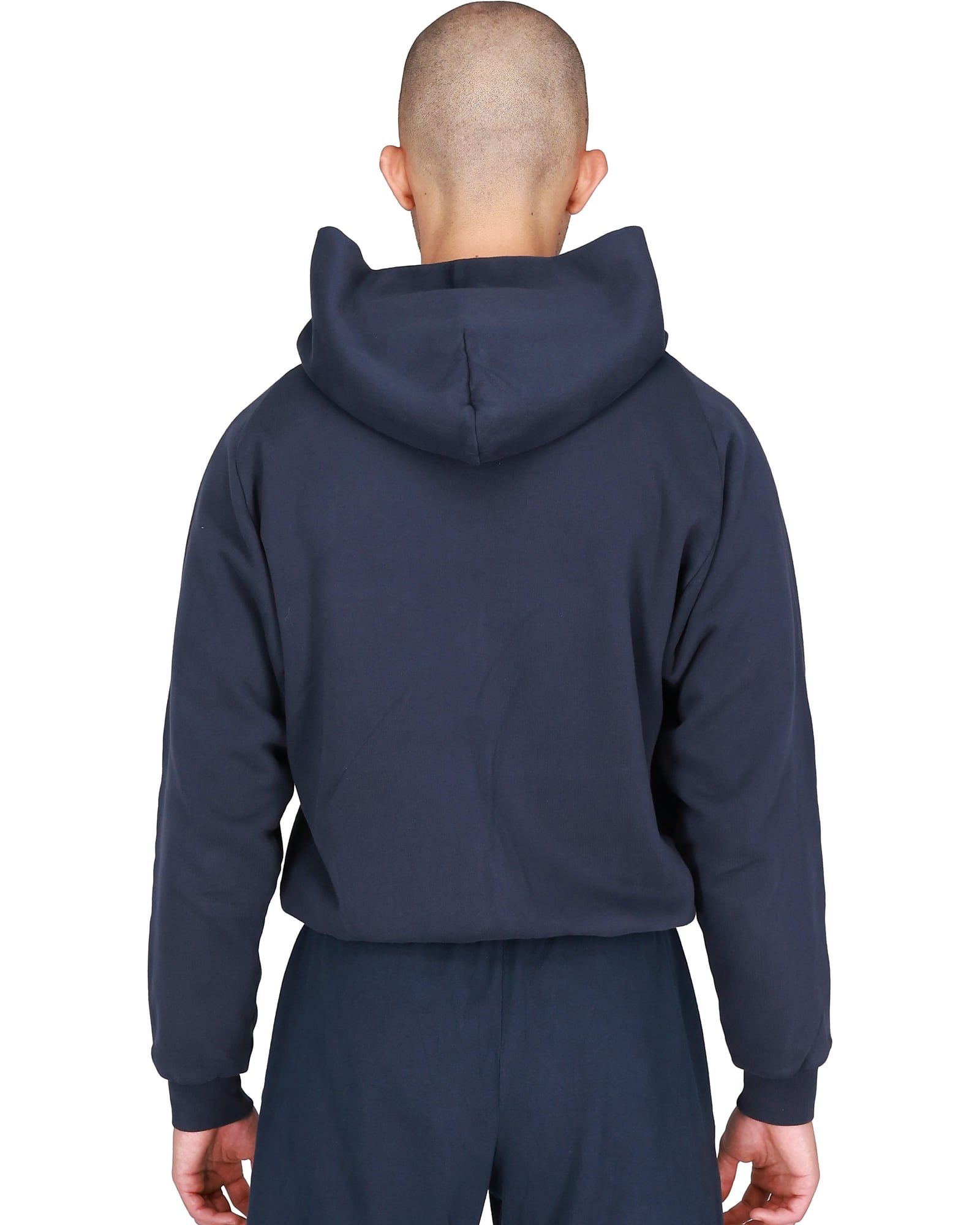 The Yeezy Gap zip-up missed Gap entirely and sold out on yeezy.com. Navy, back, on a model.