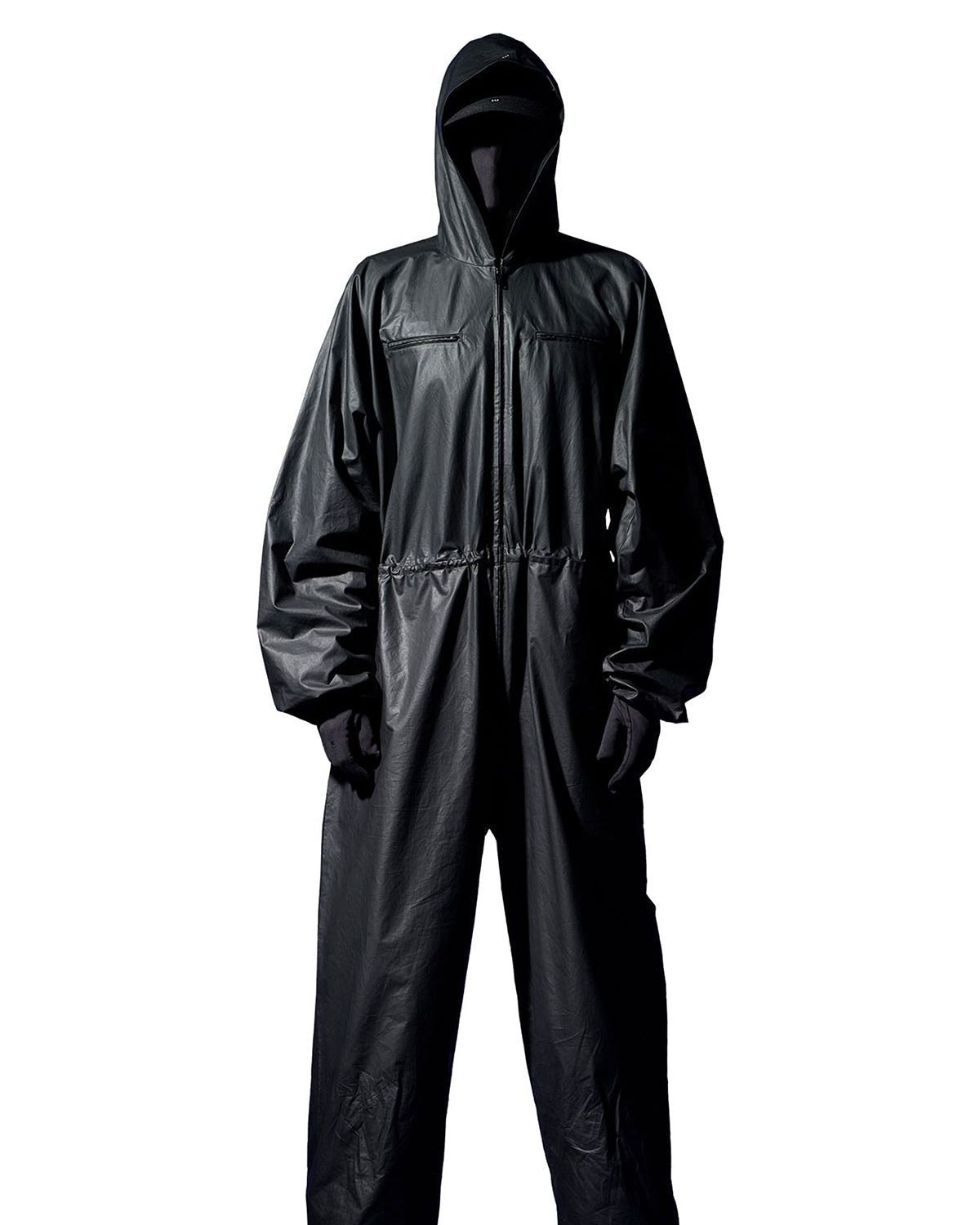 Ye walked out on Gap in September 2022. The Balenciaga drops kept coming.. Black, Coated Cotton Overalls on a woman, cropped in.