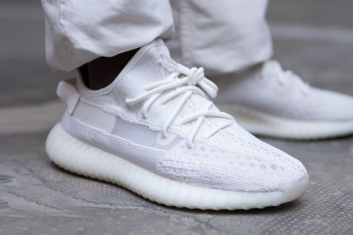 Blue Tint wore SPLY-350 in red. A year later, Static wiped the stripe clear.. Bone on foot, white trousers, wet concrete, Mar 2022.